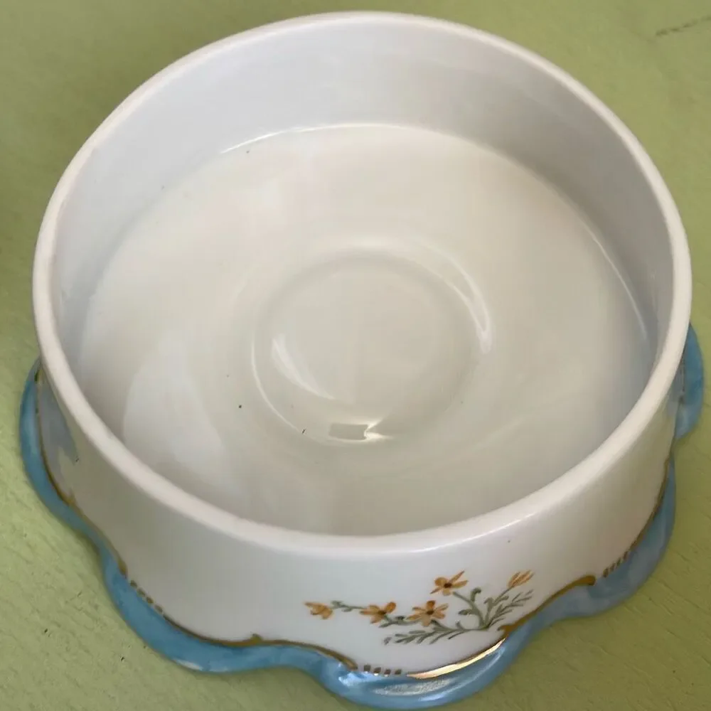Vintage hand painted porcelain trinket box  by Jeanette Wriedt .